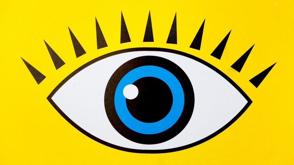 wide eye in yellow background picture
