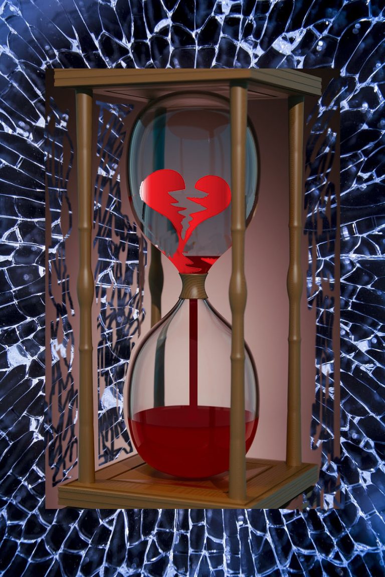 broken heart with dripping blood in hourglass