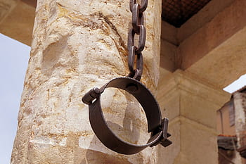 shackles on a pillar